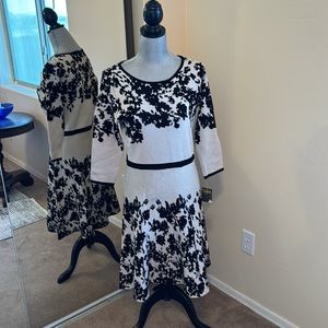 Taylor NWT sweater dress. Beige/black floral print. Hits just above knee. Large.